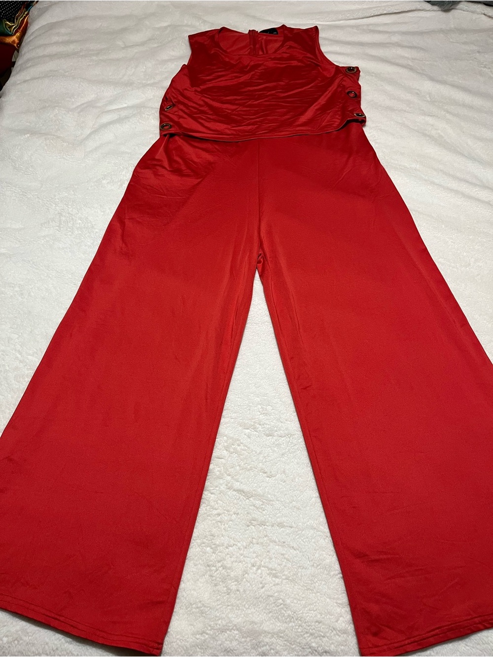 Alison Andrew’s Sleeveless Red Wide-Leg Jumpsuit